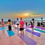 Yoga all'aperto presso la palestra Dinamikclub di Pisa
